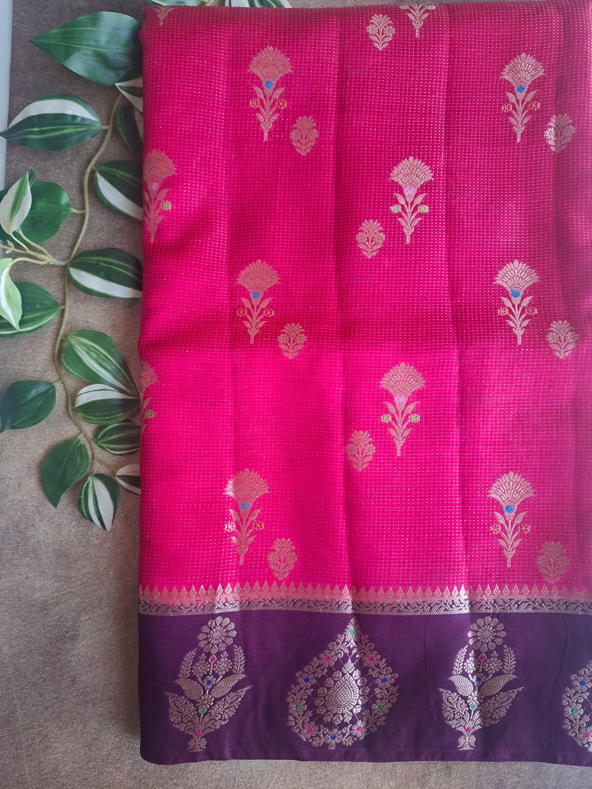 rani pink raw mango with contrast border with meenkari work saree