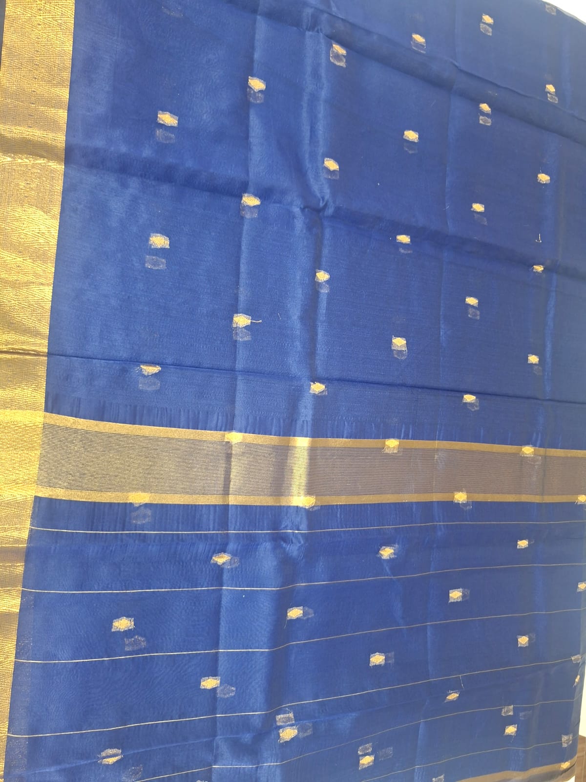 Blue tissue with gold  border