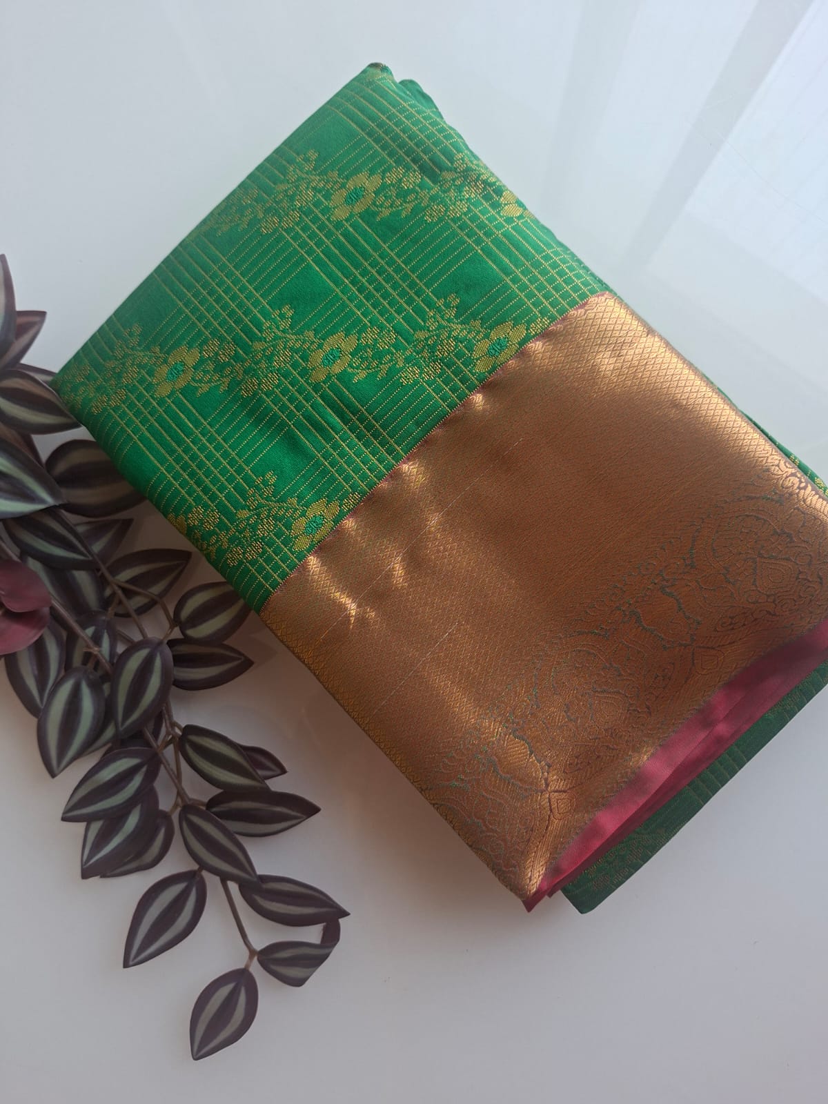 green semi silk saree with kanchi border