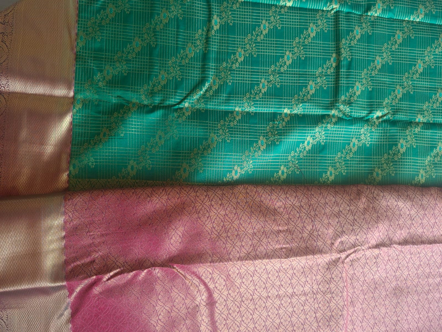 green semi silk saree with kanchi border