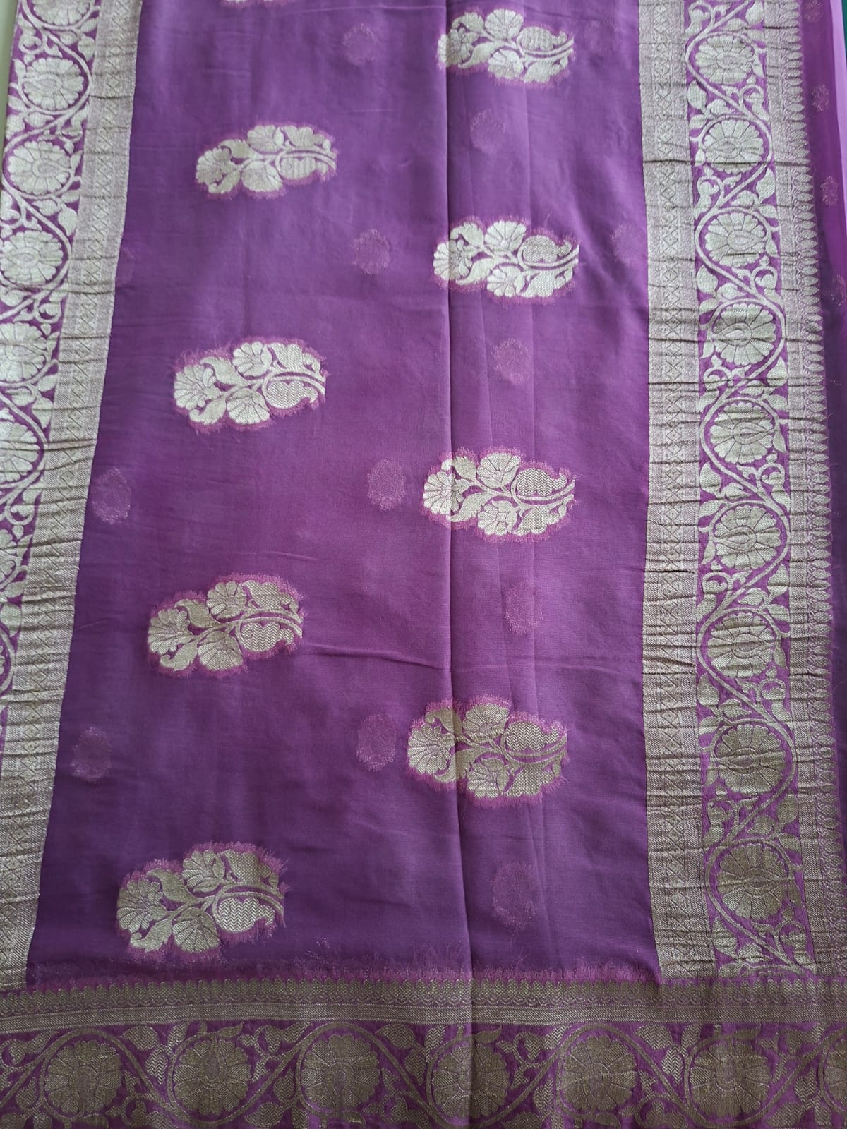 green semi chiffon with pink border and small motif