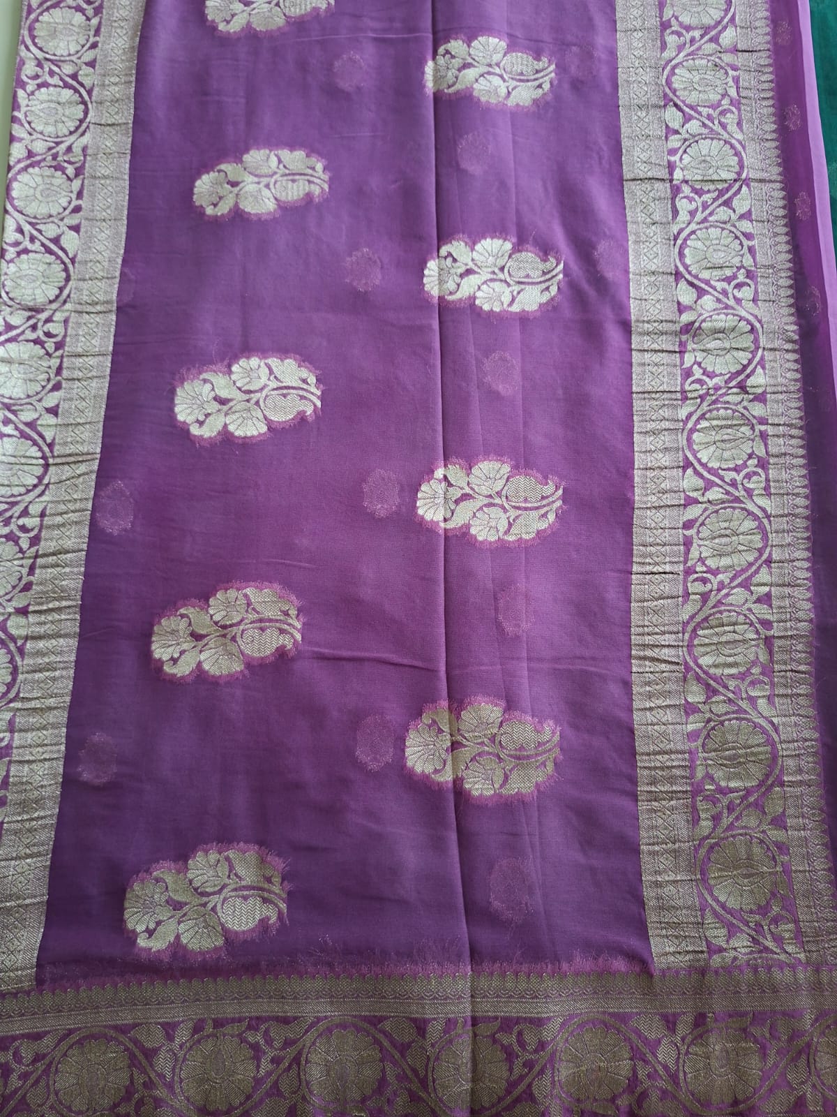 green semi chiffon with pink border and small motif