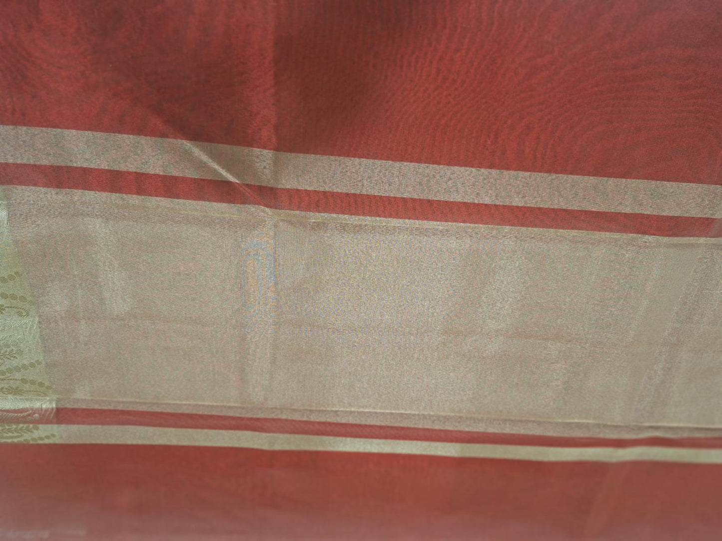 marron tissue with gold saree