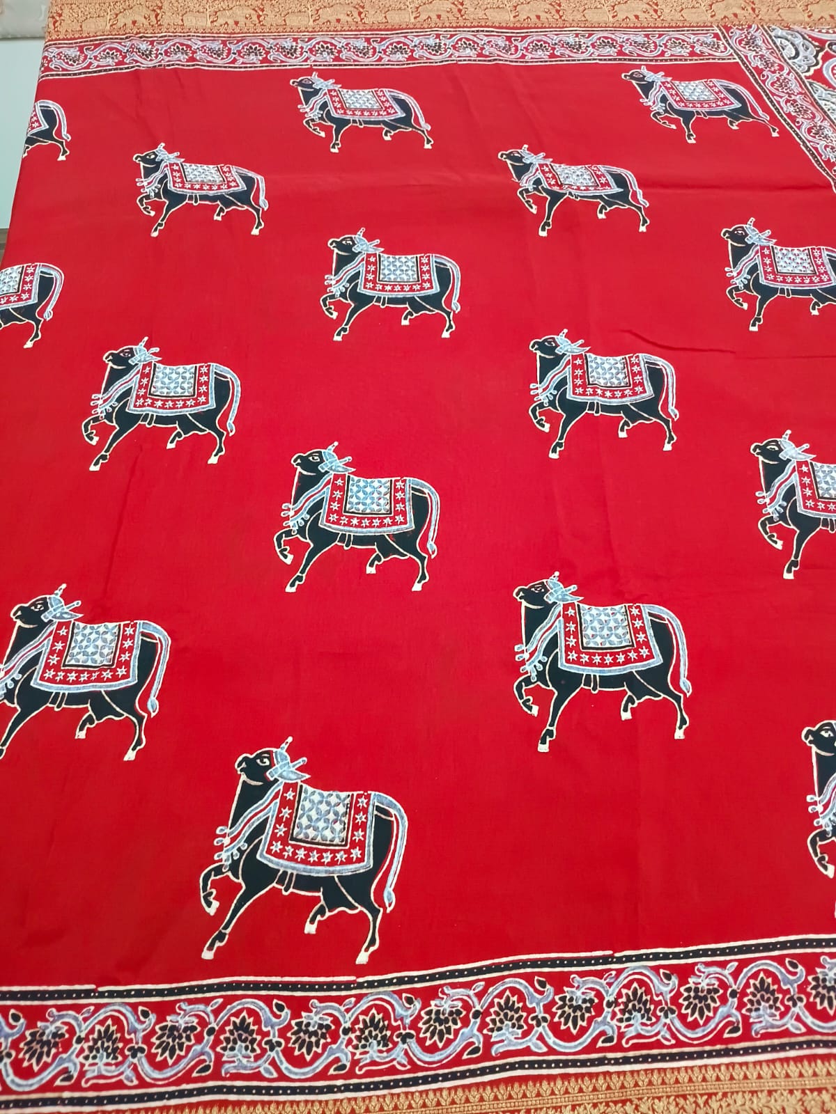 red pure modal dola with cow print saree