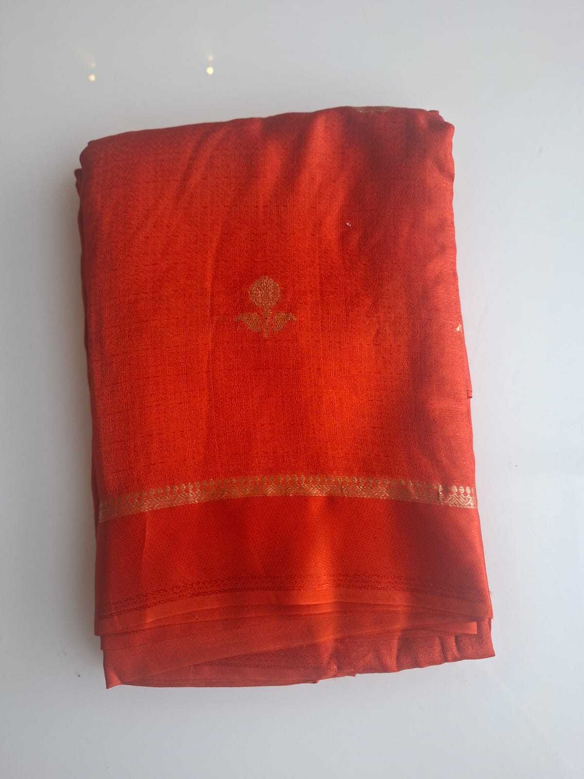orange viscose khadi silk fabric with satin border