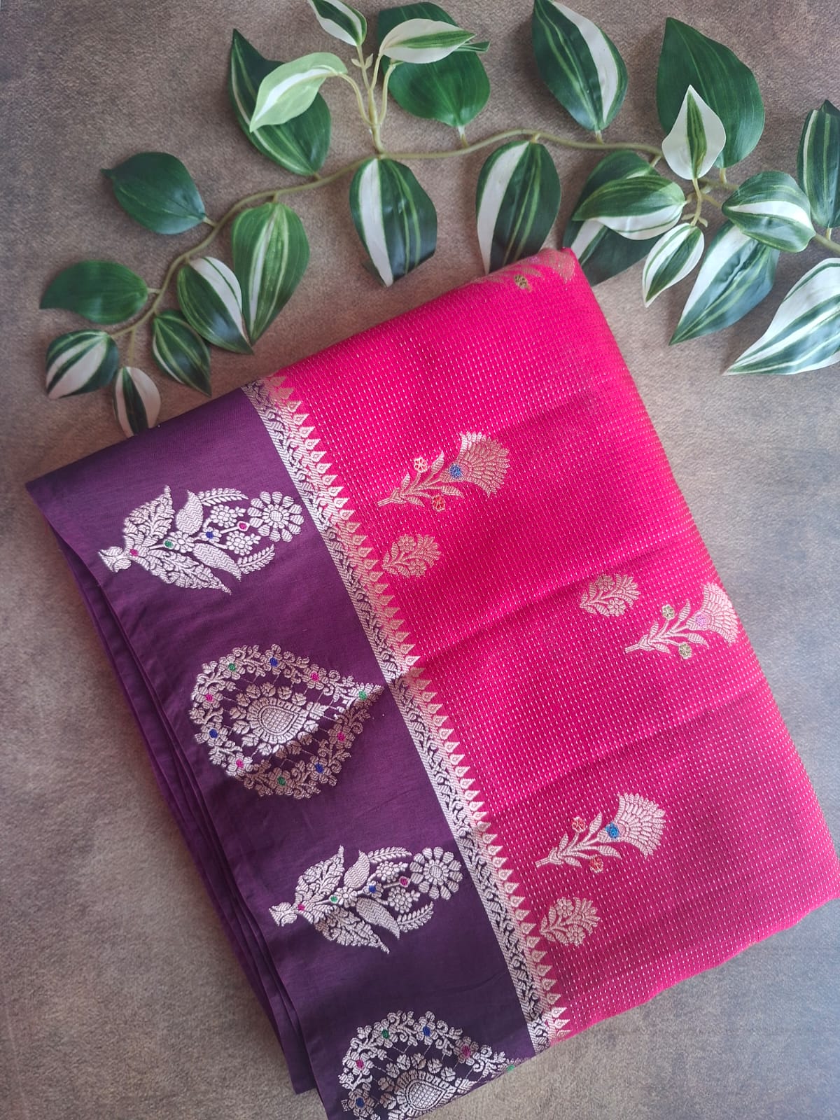rani pink raw mango with contrast border with meenkari work saree