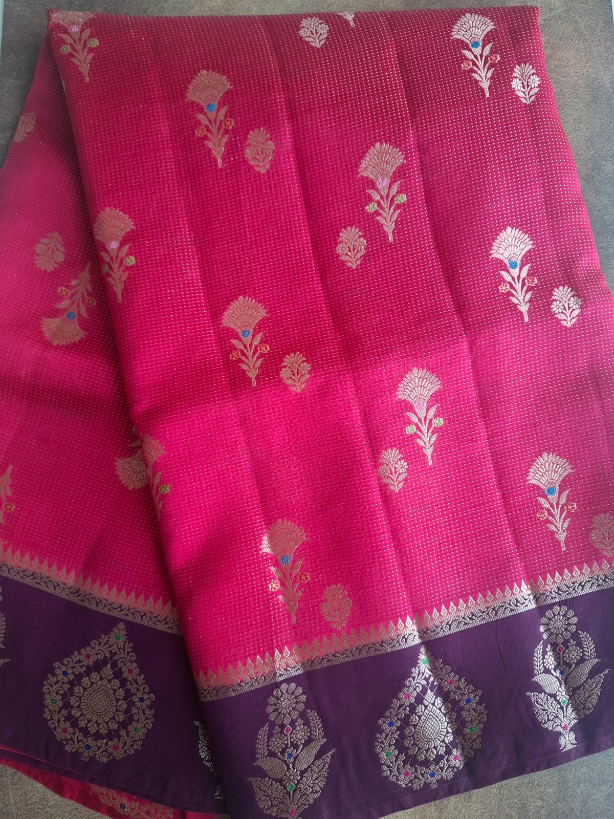 rani pink raw mango with contrast border with meenkari work saree