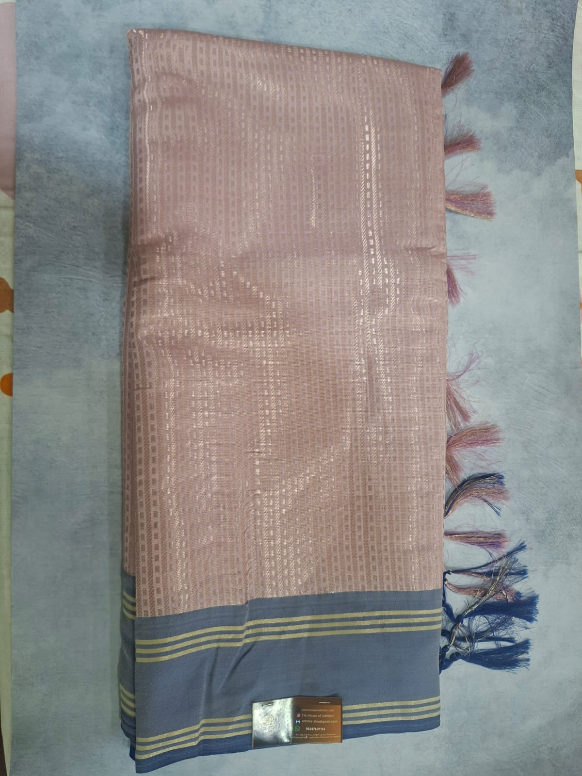 Textile with a woven pattern on a plain background