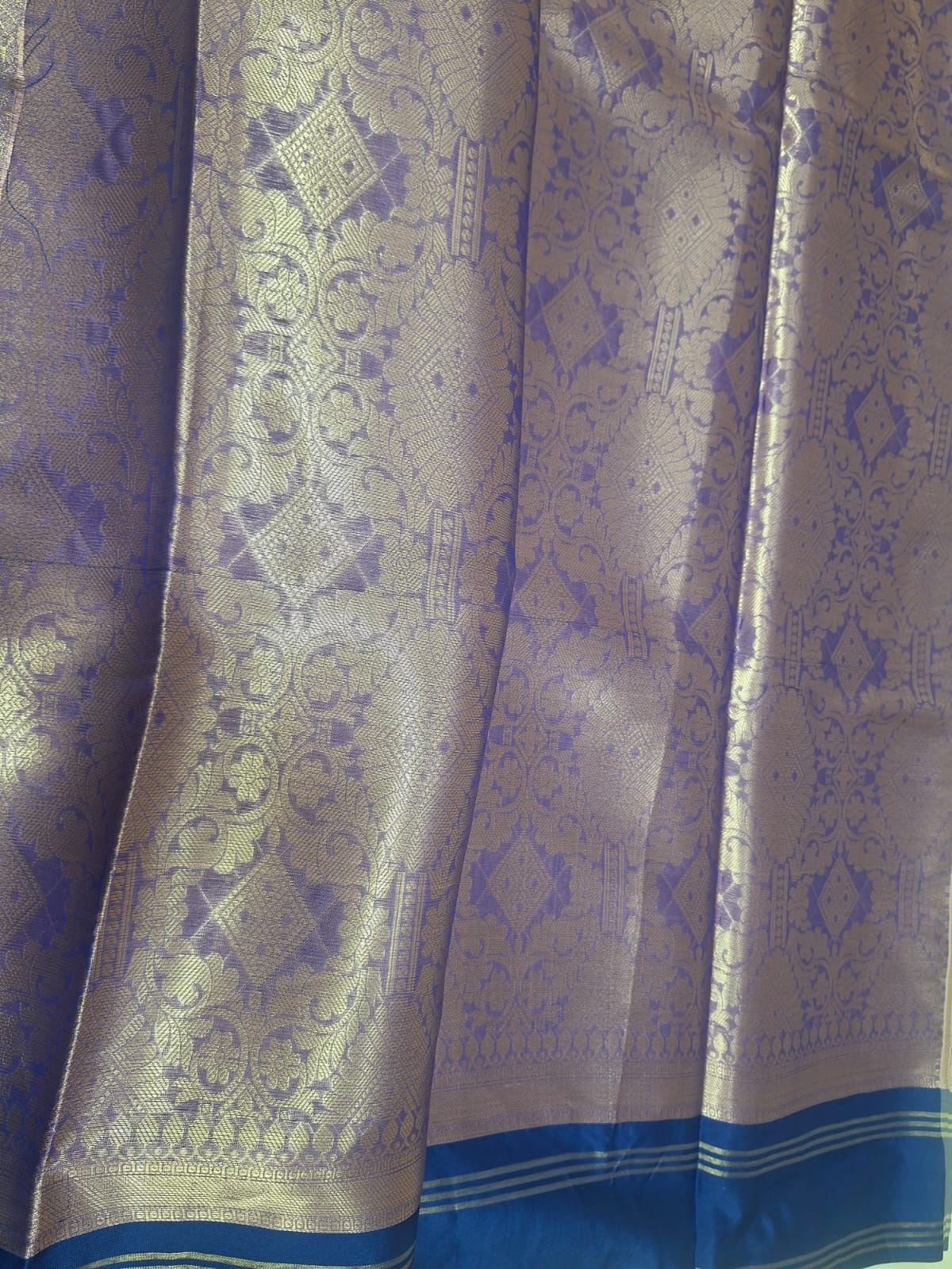 peach tissue with blue border saree