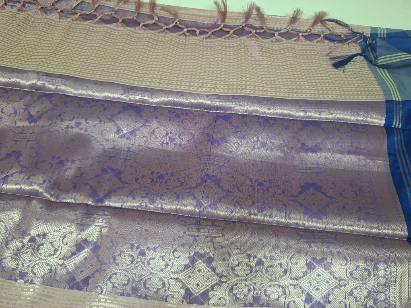 peach tissue with blue border saree