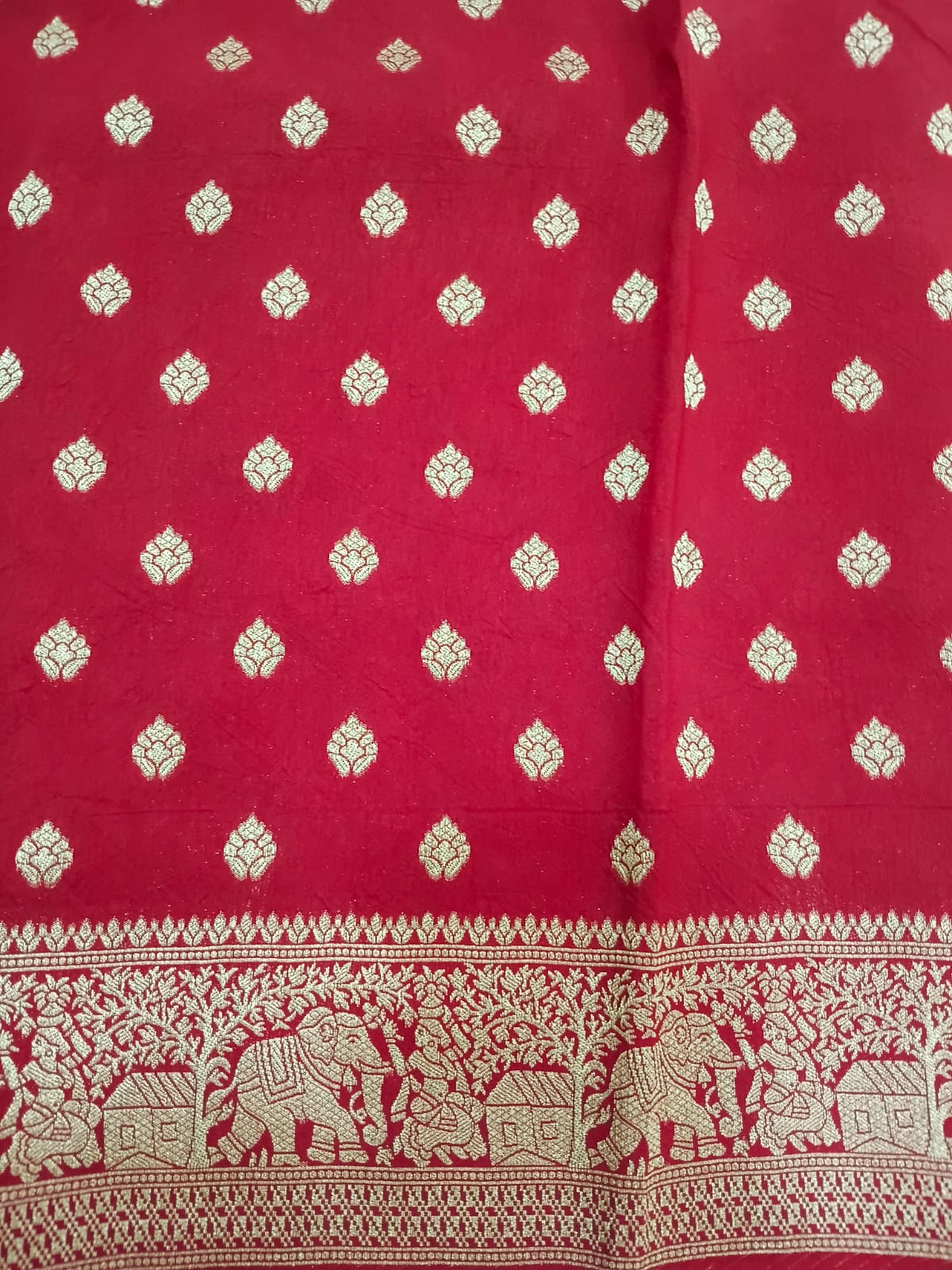 red modal silk circle print saree