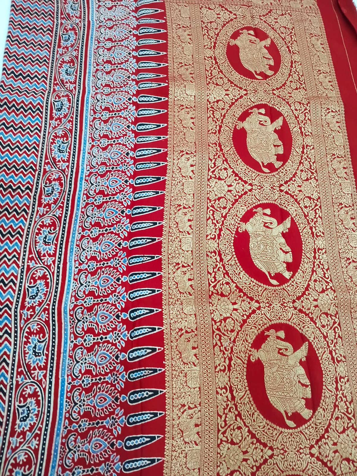 red modal silk circle print saree