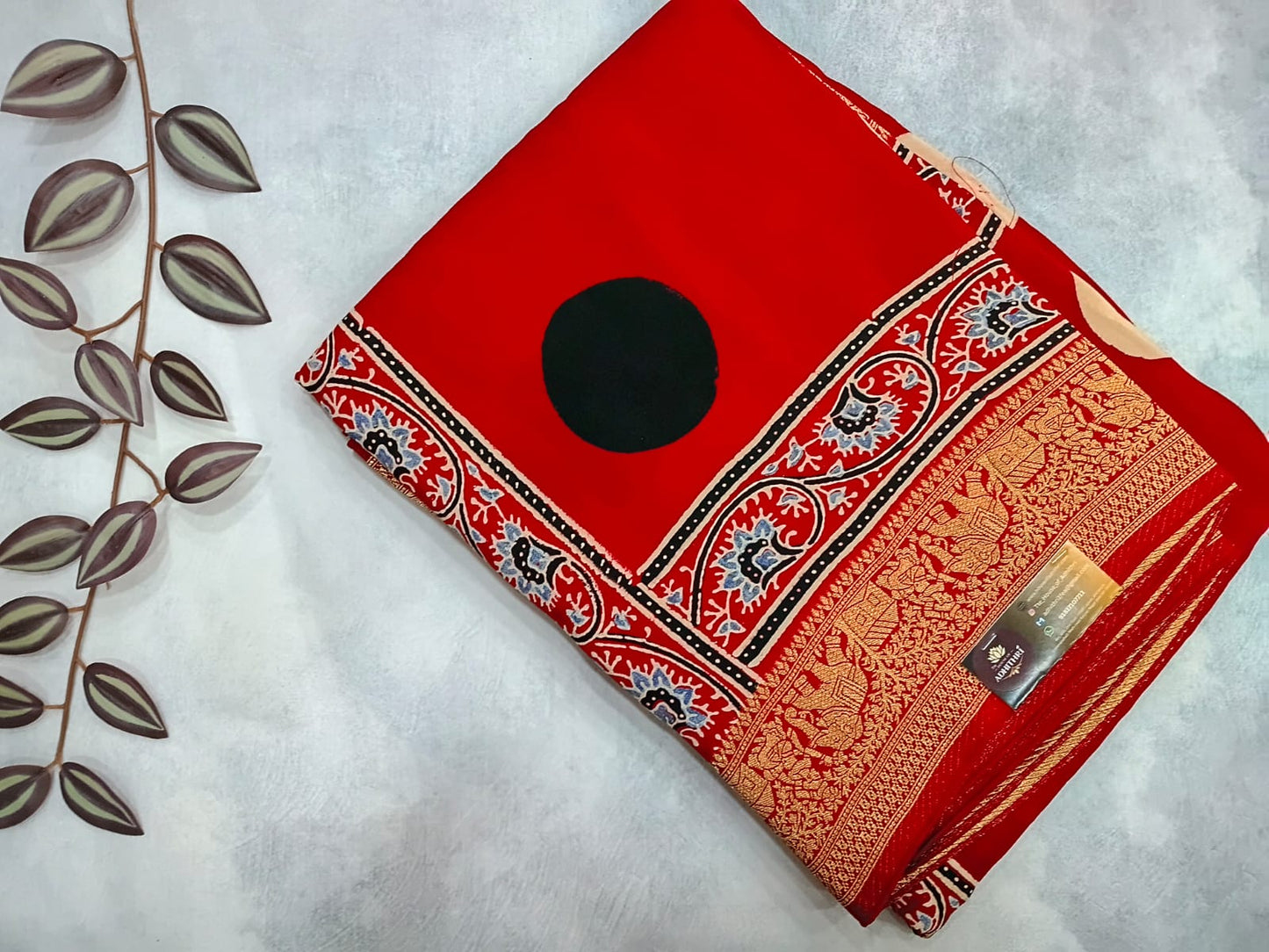 red modal silk circle print saree