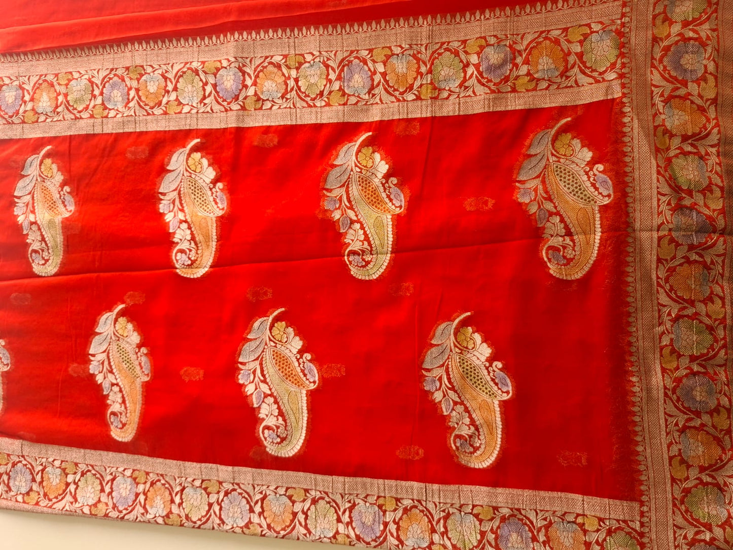 red semi chiffon meenakari border saree