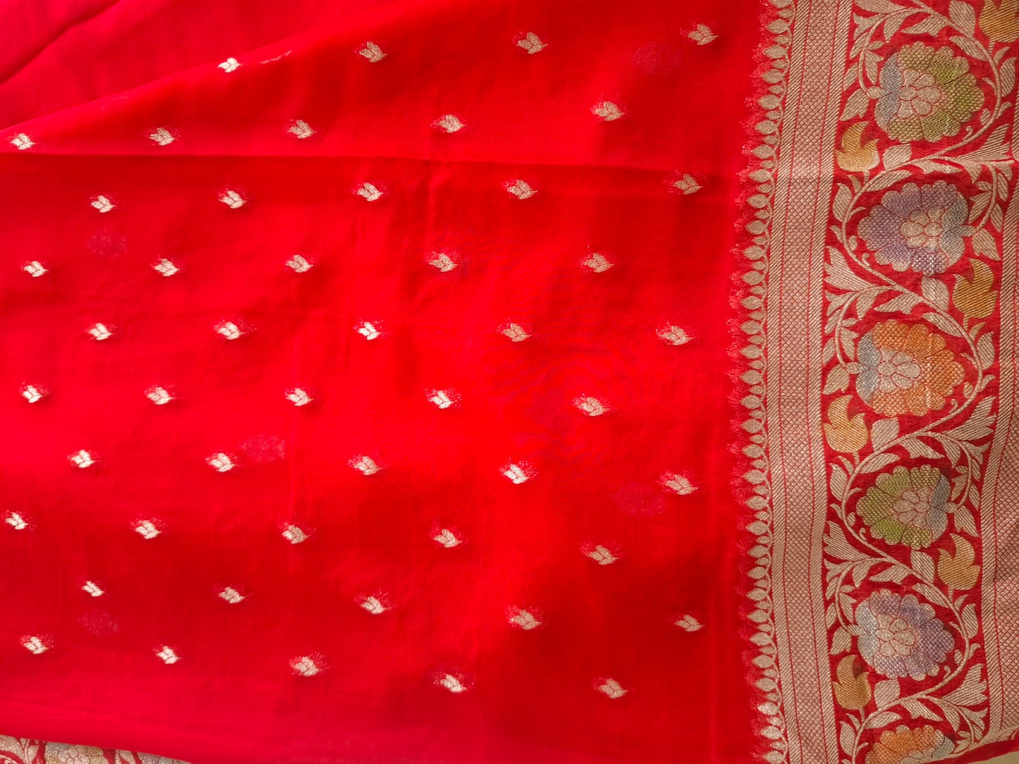 red semi chiffon meenakari border saree