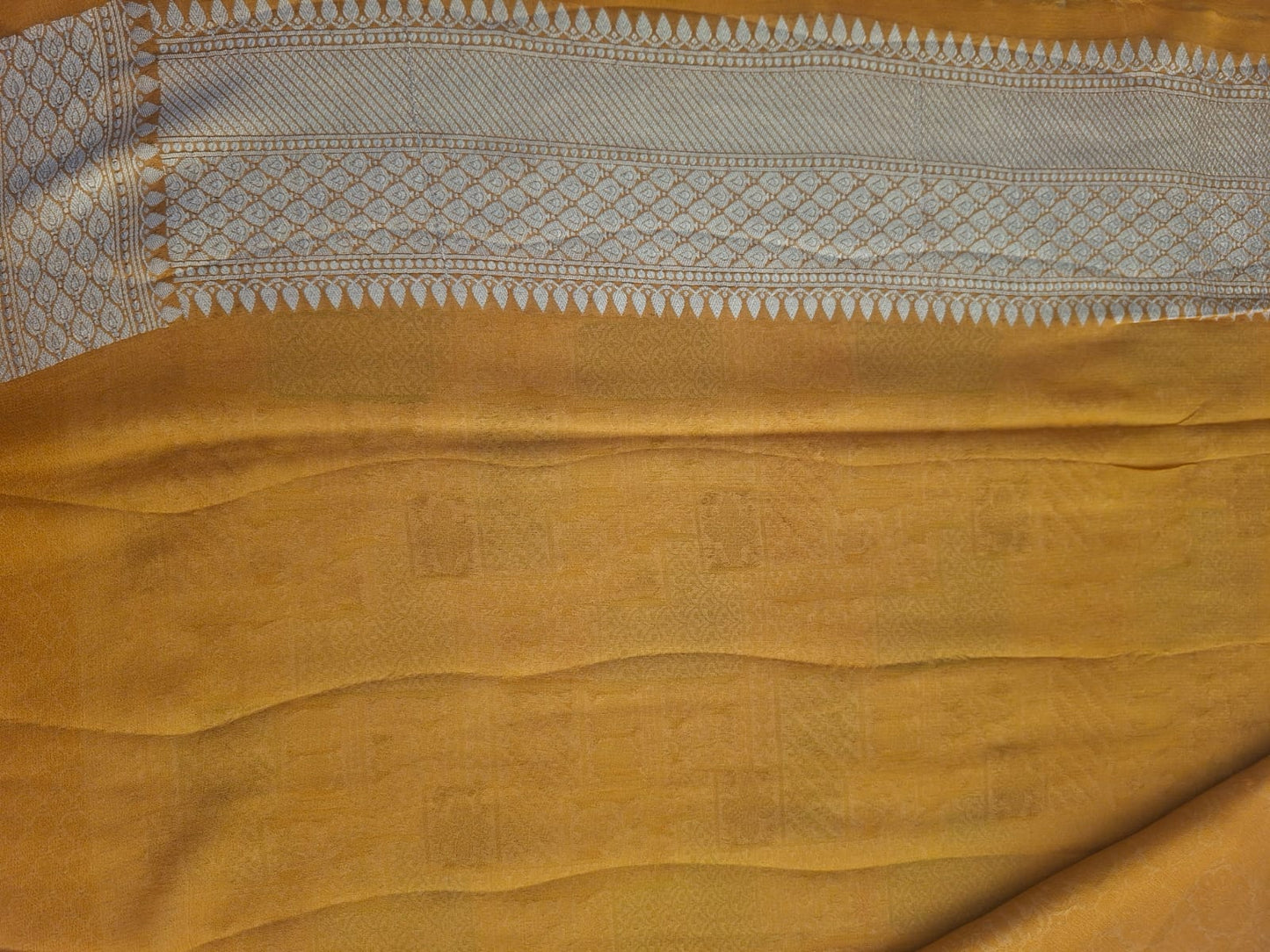 yellow georgette brocade saree 101