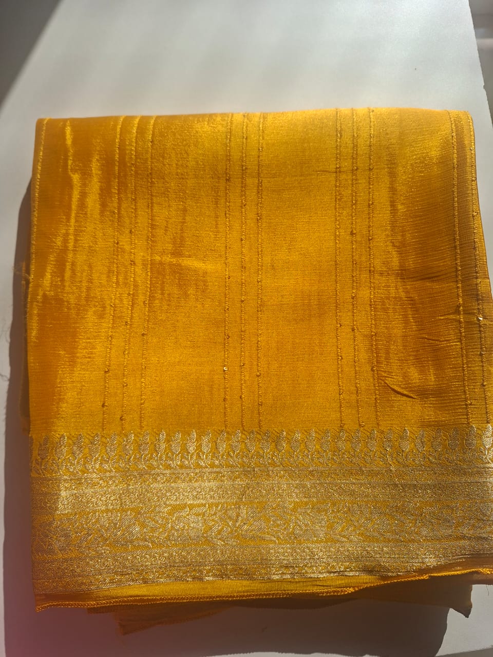 yellow with copper zari semi georgette tikki saree 1