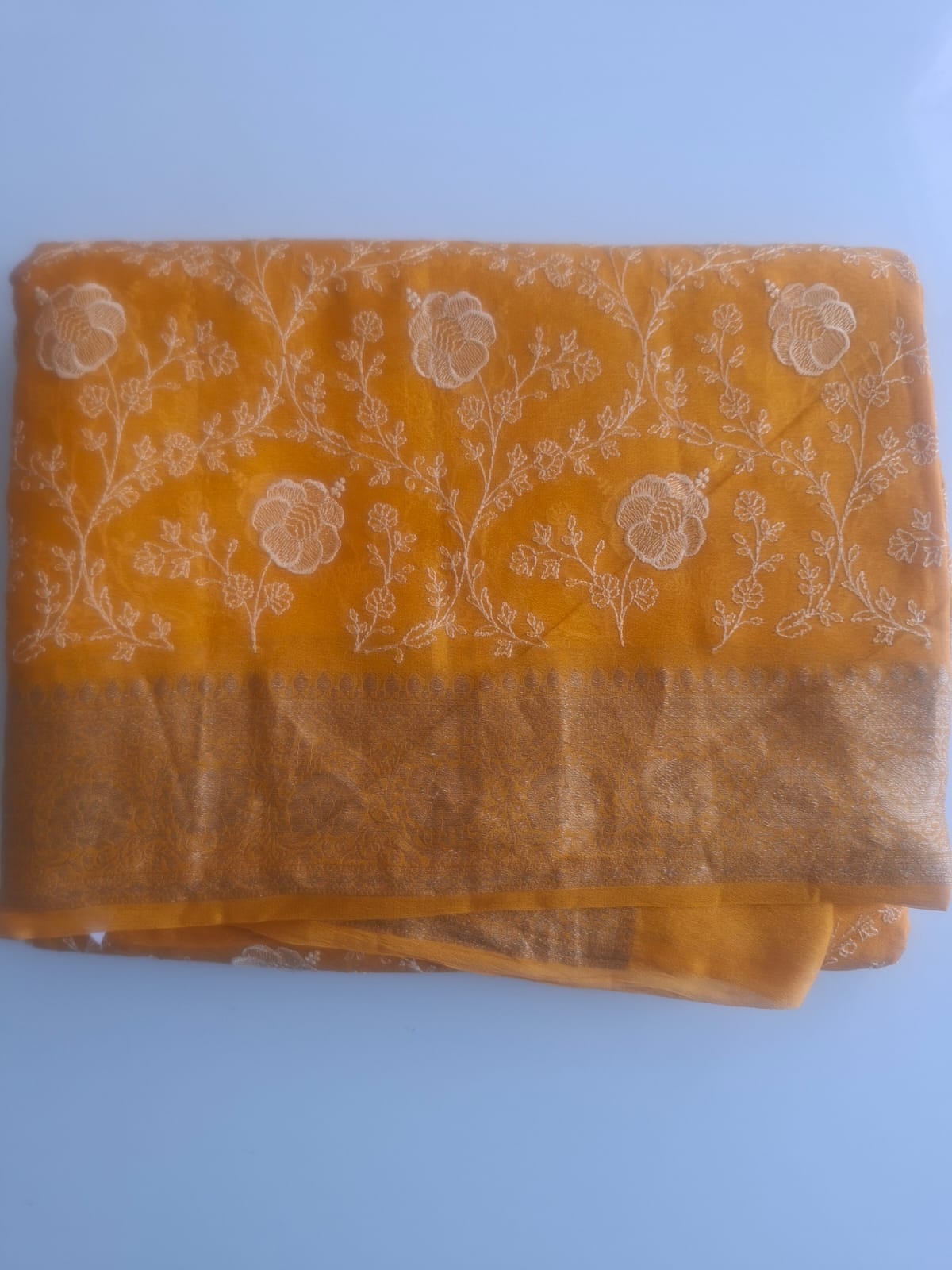yellow pure  kaddi chiffon chikankari saree